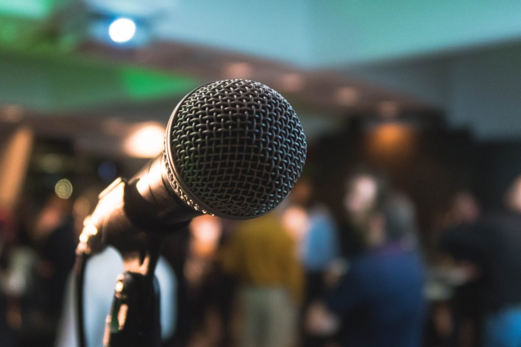 A microphone at a virtual podium of a writer's conference