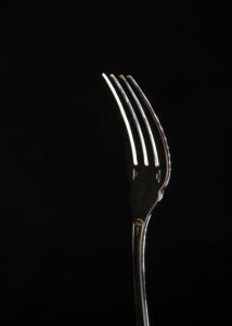 A picture of a fork that explains how to communicate effectively during holiday gatherings