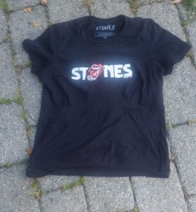 A rolling stone T Shirt from the Diamon Hackney 2024 Tour on a Stone walk